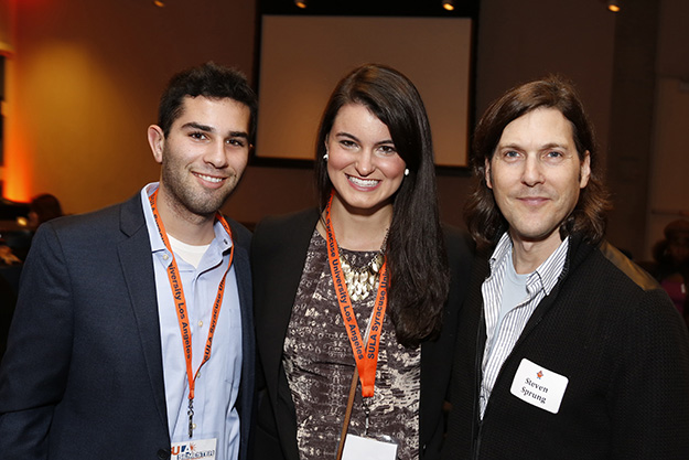 Scott networking with fellow SULA student Samantha Sloan and SU alum Steven Sprung. 